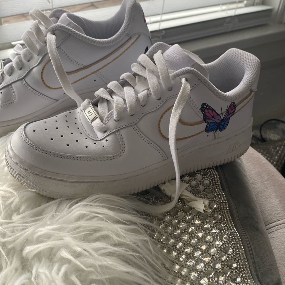 I have some Nike sneakers with butterflies on them so cute